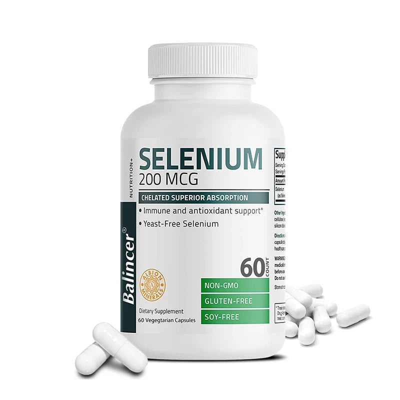 Selenium bottle labelled 'Selenium 200 MCG' with capsules on a white background