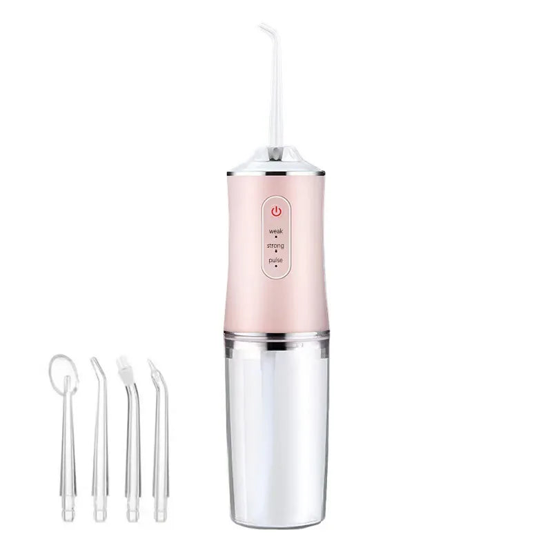 Pink dental water flosser with clear nozzles on a white background