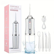 Portable oral irrigator with packaging, USB cable, and cleaning brush on a white background
